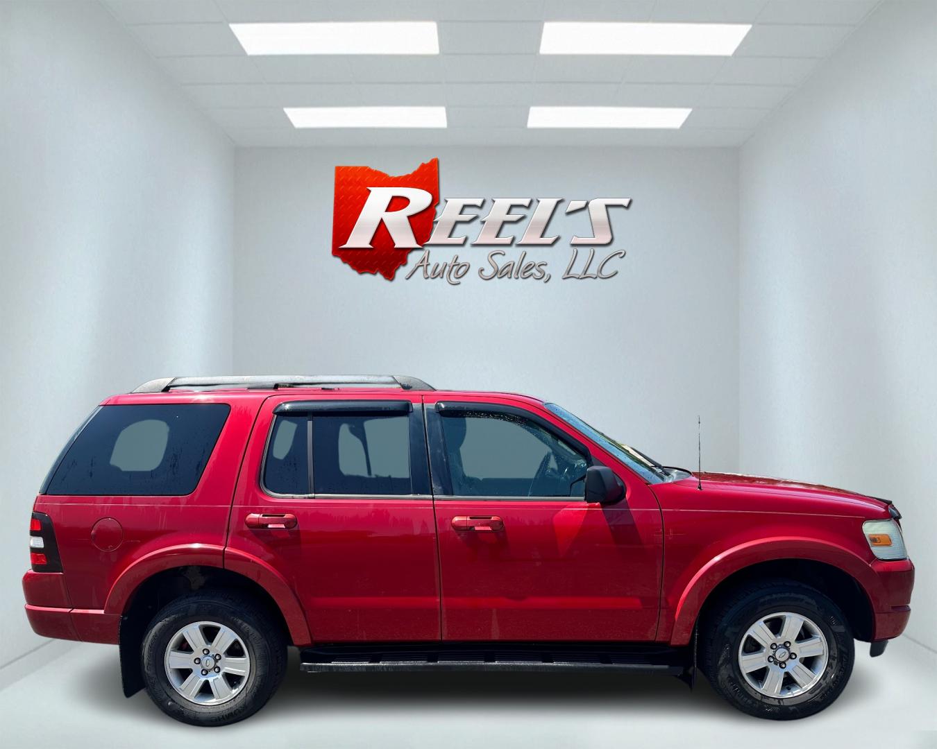 2009 Red /black Ford Explorer XLT (1FMEU73E89U) with an 4.0L V6 engine, 5-Speed Automatic transmission, located at 11115 Chardon Rd. , Chardon, OH, 44024, (440) 214-9705, 41.580246, -81.241943 - This 2009 Ford Explorer is a reliable and capable SUV, offering a 4.0L V6 engine paired with a 5-speed automatic transmission and full-time 4WD system. With a 3,500-pound towing capacity, it's suitable for moderate hauling needs. Additionally, the power driver's seat provides comfort and convenience - Photo#3